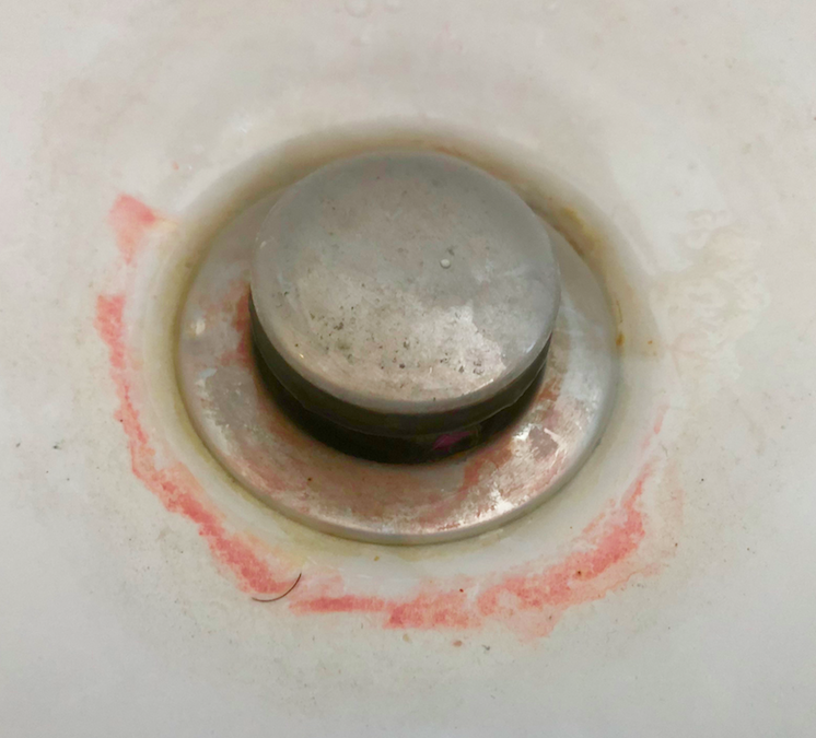 What Are the Pink Stains in My Shower, Sink, and Toilet?